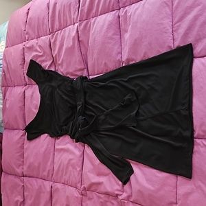 Sexy, flattering Avon sleeveless black wrap dress size Small.